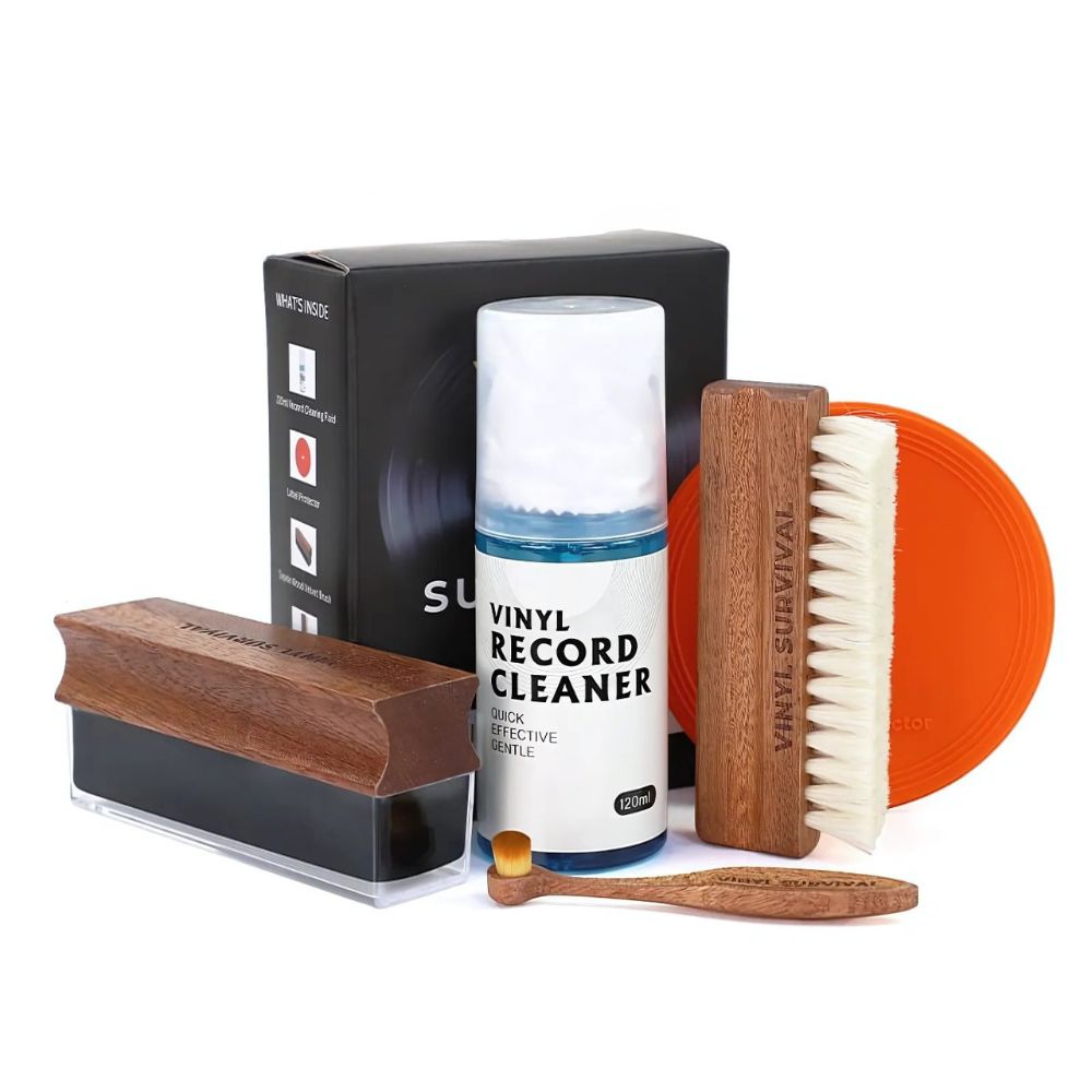 The vinyl survival record cleaning kit: velvet brush, record label, deep grove bristle brush, stylus brush, cleaning fluid, microfibre cloth